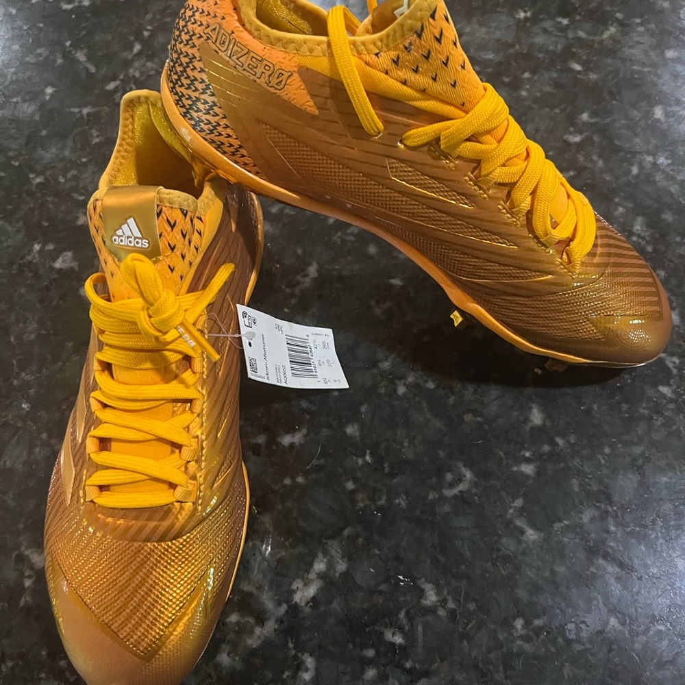 Adidas adzero Afterburner gold cleats.